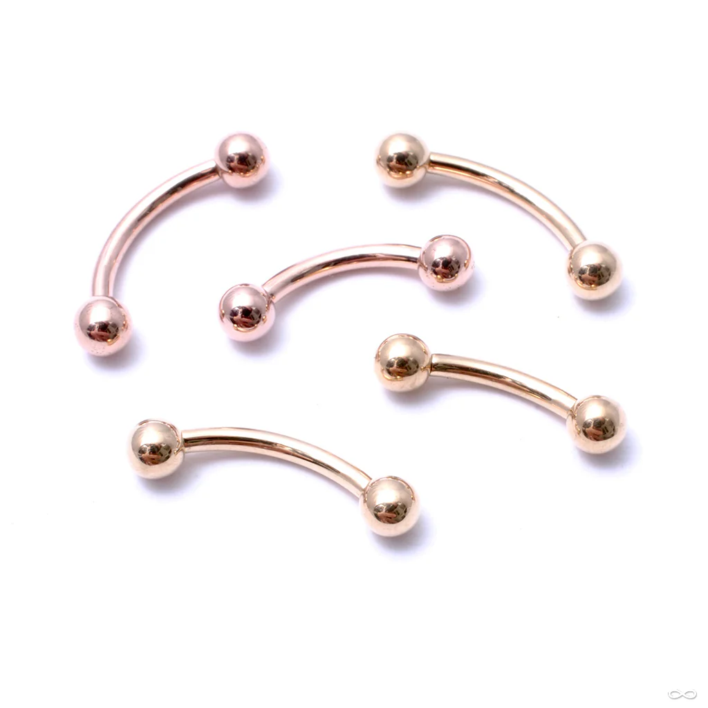 Curved Threaded Barbell with Balls in Gold from LeRoi